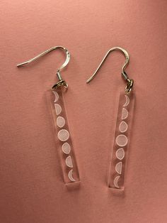 These earrings are lightweight. They are made out of acrylic and the moon phases are engraved into them.  If you have any questions please feel free to contact me. Space Earrings, The Moon Phases, Moon Space, Earrings Moon, Clear Earrings, Earrings Acrylic, Phases Of The Moon, Earrings Cute, Acrylic Earrings