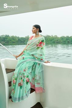 Artistic Floral prints crafted on the delicate Linen Fabric. Pastel colours, floral print and linen fabric make the ideal attire. Linen fabric is cherished by women. Linen is lightweight and can be worn all day. This saree comes along with contrast colour blouse. The saree can be worn on festivals, family gatherings, and even on work. Get perfect fresh vibes by styling your saree with oxidized earrings, necklace and sunglasses! Be the charm at your next event with this high-style look. Digital Floral Prints, Fresh Vibes, Oxidized Earrings, Linen Sarees, Indian Designer Sarees, Latest Indian Saree, Latest Designer Sarees, Indian Sarees Online, Linen Saree