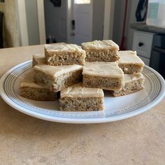 several pieces of cake sitting on top of a white plate