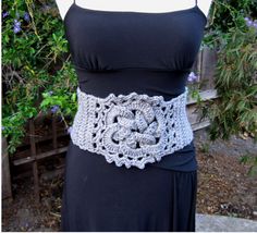 "This beautiful heather grey crochet corset belt will be the highlight of any outfit. If you have a boring dress that needs a little (or a lot) of pizzaz, I think you may have found the right accessory! This belt would also look great with a flowing bohemian outfit. Due to the fact that it is corseted in the back, the size can be adjusted to a larger length.This belt is so pretty, and so much fun to make, I hope you will want one in every color! Measurements: Length: 26 inches, 66 cm (can adjust Crochet Corset Belt, Pixie Belt, Crochet Corset, Bohemian Outfit, Crochet Costumes, Crochet Belt, Grey Crochet, Bohemian Accessories, Corset Belt