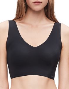 PRICES MAY VARY. Get a no-bra feel in this lightweight V-neck bralette Soft, wire-free cups with removable foam inserts Non-adjustable stretch straps for a close to body fit No closure simply glides over head Ultra-soft, stretch nylon that disappears under clothing  Calvin Klein Womens Underwear Size Chart  Calvin Klein Underwear Womens Bralette Size Chart  For a clean look under your favorite clothes, add this simple Calvin Klein® Underwear Invisibles Comfort Light Lined Bralette V-Neck. Smooth Calvin Klein Bras, White Lace Bralette, Calvin Klein Women, Accessories Clothing, Clean Cut, Lace Bralette, Sophisticated Style, Bralette, Clothing Brand