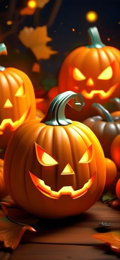 two pumpkins sitting on top of a wooden table next to leaves and falling leaves