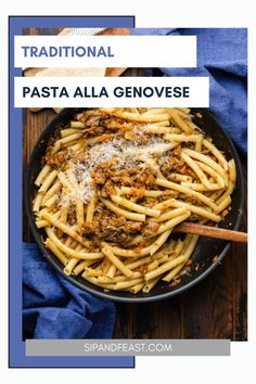 pasta with meat and cheese in a skillet on top of a blue towel next to a