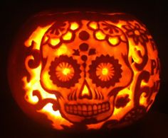 a pumpkin carved to look like a skull