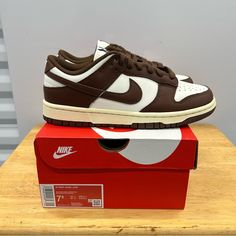 Spruce Up Your Sneaker Collection With These Nike Dunk Low Sneakers. These Sneakers Are Perfect For Various Occasions Including Casual Wear, Activewear, And Workwear. Women’s Us Shoe Size 7.5 And Uk Shoe Size 5. The Sneaker Is Brand New And Authentic, With No Signs Of Wear And Tear. 100% Authentic. Made In Vietnam. In-Hand Ready To Ship. No Major Flaws Seen. Brand New. Please See Pics Above For A Closer Look At Product. Legit Seller. Brown Sneakers With Boost Midsole And Round Toe, Brown Sneakers With Boost Midsole And Medium Fit, Brown Sneakers With Contrast Sole, Brown Cushioned Slip-on Sneakers, Nike Brown Sneakers With Contrast Sole, Brown Nike Sneakers With Rubber Sole, Brown Sneakers With Cushioned Footbed, Medium Fit, Brown Cushioned Sneakers Medium Fit, Casual Brown Sneakers Medium Fit