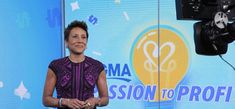 a woman standing in front of a camera on a television screen with the words ma session of profi