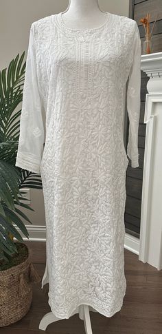 A closet must have, classic Chikankari white kurta on georgette. Beautifully hand embroidered ! Liner included. Kurti length-46 inches Elegant White Traditional Wear With Cutwork, Traditional White Chikankari Long-sleeve Wear, White Traditional Wear With Chikankari Embroidery And Long Sleeves, White Unstitched Chikankari Embroidered Kurta, Elegant White Kurta With Chikankari Embroidery, White Unstitched Traditional Wear With Cutwork, Fitted White Kurta With Floral Embroidery, White Long Sleeve Kurta With Chikankari Embroidery, White Long Sleeve Kurta With Cutdana