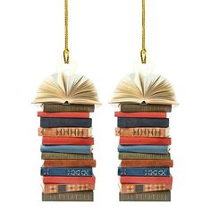 two bookends made out of books are hanging from the end of each other