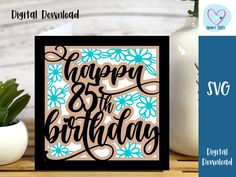 a birthday card with the words happy 35th birthday in black and blue on it next to a potted plant