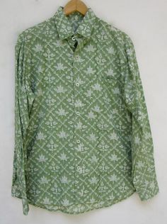 "ITEM DESCRIPTION green floral geometrical printed cotton summer men shirts - long sleeve with buttons men shirts - collar neckline with pockets men shirts Fabric: 100% cotton soft light weight ethnic print fabrics Product: Men's woven Hand block Printed Shirt Look: Vintage, Summer, Bohemian Sizing: Men's Shirt SMLXL Chest36 inch38 inch40 inch42 inch Shoulder17 inch18 inch18 inch19 inch Length26 inch26 inch27 inch28 inch Half Sleeve8 inch8 inch8 inch8 inch Full Sleeve22 inch22 inch22 inch22 inch Green Floral Print Long Sleeve Shirt, Green Long Sleeve Shirt For Summer, Green Long Sleeve Summer Shirt, Green Printed Button-up Shirt, Green Floral Print Button-up Shirt, Green Fitted Printed Shirt, Fitted Green Printed Shirt, Casual Green Block Print Tops, Green Cotton Shirt With Floral Print