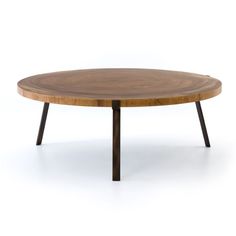 an oval wooden table with black legs and a wood top, on a white background