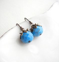 "Turquoise Drop Earrings In Antique Brass. Dangle Earrings. These beautiful earrings are made from howlite turquoise faceted rondelle beads 10mm, hand antiqued brass ear wires and antique brass findings.  The length of these earrings is about 0.75\". Check out my store to see more of my creations http://www.etsy.com/shop/anechkasjewelry Thank you for looking!" Turquoise Earrings With Lever Back Ear Wires As Gift, Turquoise Earrings With Lever Back Ear Wires For Gifts, Turquoise Drop Crystal Earrings Gift, Nickel-free Turquoise Crystal Earrings For Gift, Berry Earrings, Blue Stone Earrings, December Birthstone Jewelry, Turquoise Drop Earrings, Turquoise Howlite