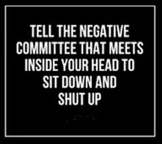 a sign that says tell the negative committee that meets inside your head to sit down and shut up