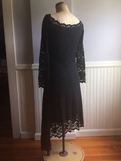 "Black Stretch lace dress that sits right on the shoulder with a beautifully designed neckline. Made in Canada, under the label Joseph Ribkoff. Tag inside indicates it's a size 12( Canada, USA, Mexico) size 40(Germany),Size 14(UK),size 42,(France). Fabric content, 71% nylon, 26% rayon, 3% spandex, 100% polyester lining. The great attribute of this dress is you can hand wash in cold water, dry flat! No dry cleaning, no unnecessary chemicals. Lines are very flattering and fitted to the body with a Formal Black Attire, Goth Wedding Dress, Goth Attire, Lace Dress Formal, Goth Wedding Dresses, Stretch Lace Dress, Black Stretch Lace, Black Attire, Goth Wedding