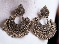 Beautiful  Jhumkas One of a kind  Very well made and beautiful  Excellent condition  These hang 2.5 inches Very beautiful design Rustic silver color Handmade and sturdy Ornate Silver Chandelier Earrings For Festivals, Silver Metal Chandbalis For Festive Occasions, Bohemian Silver Chandbalis For Festive Occasion, Heavy Silver Chandelier Earrings For Festive Occasions, Heavy Silver Metal Chandbalis, Silver Metal Chandbalis As Gift, Silver Heavy Chandelier Earrings For Festivals, Elegant Silver Jhumkas For Festival, Heavy Silver Chandelier Earrings For Festivals