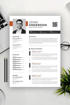 a professional resume template with an orange accent