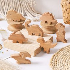 wooden toys are sitting on a table