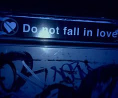 a sign that says do not fall in love