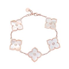 "This absolutely gorgeous rose gold over sterling silver mother-of-pearl and cubic zirconia flower pendants bracelet is sure to become a favorite piece in your jewelry collection. This absolutely gorgeous rose gold over sterling silver mother-of-pearl and cubic zirconia flower pendants bracelet is sure to become a favorite piece in your jewelry collection. Length: 8 in. Clasp: lobster-claw Metal: sterling silver Plating: rose gold tone Finish: polished Packaging: boxedSTONE DETAILS Stone type: c Onyx Bracelet, Gorgeous Bracelet, Flower Bracelet, Silver Pendants, Pendant Bracelet, Gemstone Bracelets, Gold Plated Sterling Silver, Silver Bracelets, Gemstone Pendant