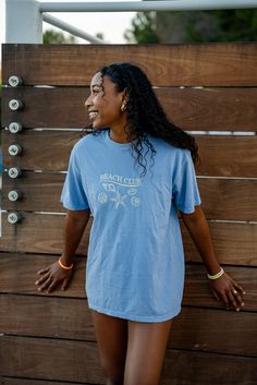 Summer all year round here with our Beach Club Summer embroidered tee. This beautiful chambray blue dyed 100% US Ring Spun Cotton Tee features a yellow shell embroidery design in the center chest. Details: 100% US Ring Spun Cotton Sizes S-4XL. Oversized Fit. Shirt color may vary in different lightings Garment dyed for that lived in feel and almost no shrinkage at home. Topstitched, classic width, rib collar Made With Respect Proud member of the U.S. Cotton Trust Protocol Production & Shipping: P Light Blue Crew Neck Beach T-shirt, Light Blue Crew Neck T-shirt For Beach, Light Blue Cotton Vacation T-shirt, Light Wash Cotton Beach Top, Washed Blue Cotton Beach Tops, Light Blue Cotton T-shirt For Beach, Light Blue Cotton T-shirt For The Beach, Blue Embroidered Relaxed Fit T-shirt, Blue Cotton T-shirt For Beach Season