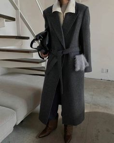 Polished, oversized structured overcoat in a classic wool alpaca fabrication. - Oversize cut- Notched lapel- Padded shoulders- Tie waist- Front flap pockets- Buttoned cuffs- Fully lined- Back vent- Measurements: Length 47.5", Bust 44", Shoulder 17.5" Sleeve 31"- Outer: Shetland Wool 80%, Baby Alpaca 10%, Nylon 10%- Dry clean- Imported Office Wool Coat With Notch Lapel And Belted Cuffs, Formal Long Wool Coat With Belted Cuffs, Elegant Wool Coat With Belted Cuffs For Winter, Formal Wool Coat With Belted Cuffs And Lapel Collar, Winter Notch Lapel Outerwear With Belted Cuffs, Office Wool Coat With Belted Cuffs And Lapel Collar, Winter Wool Coat With Belted Cuffs For Work, Elegant Oversized Wool Coat For Winter, Elegant Oversized Winter Wool Coat