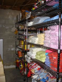 the shelves are filled with various items and ready to be put into storage bins