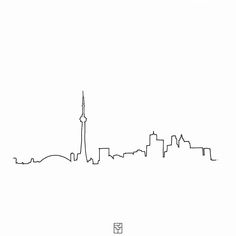 a black and white drawing of a city skyline