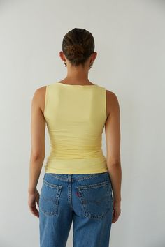 The Rylee Ruched Boat Neck Top is a ray of sunshine! This summer top features butter soft fabric, flattering side ruching, and a trendy boat neckline! Available in Butter Yellow; pair this top with your go-to denim to complete the look! Details: 95% Polyester, 5% Spandex Lots of Stretch Fully Lined Hand Wash Cold/ Line Dry Fraternity Formal, Homecoming Shoes, Red Floral Top, Boat Neck Top, A Ray Of Sunshine, Rush Dresses, Ray Of Sunshine, Butter Yellow, Boat Neck Tops