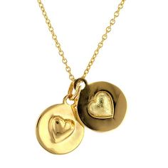 Designed as a sphere which can be split in half to reveal a convex heart on one half and a concave heart on the other side that fit together to complete the whole. Designed to be shared with your favorite person. Available in 18k yellow gold or Sterling Silver with two coordinating silver chains. Yellow Gold Plated Heart Necklace, Gold Round Engraved Heart Necklace, Gold Engraved Round Heart Necklace, Yellow Gold Double Heart Jewelry With Polished Finish, Heart-shaped Yellow Gold Necklace With Detachable Pendant, Hallmarked Yellow Gold Double Heart Necklaces, Hallmarked Yellow Gold Double Heart Necklace, Keepsake Double Heart Yellow Gold Necklace, Keepsake Yellow Gold Double Heart Necklace