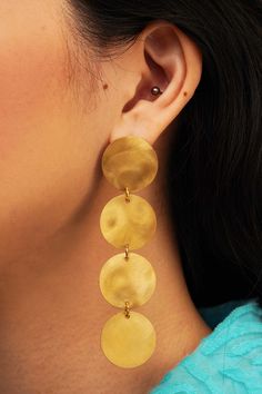 Circles are said to be the perfect shape. Made with brass pieces recycled from our capsule retainer rings, these earrings are lightweight, beautiful, and unique. Whether you take them to a party, the park, or a ball game, these earrings are perfect for whatever comes your way. Each piece is hand-designed and polished by a human being, so please allow for variability between products and what you see in photos. See Zenon in aluminum. Human Being, Brass Earrings, The Park, Circles, Brass, Human