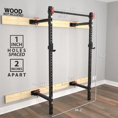 the wall mounted squat rack is shown with measurements for each side and height to fit