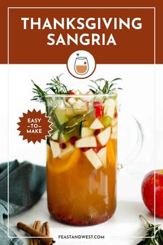 a mason jar filled with apple cider sangria