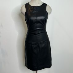 Nwt Size 4. Color Is Black. Back Zipper Closure, Lined. Approximate Measurements: Armpit-15 1/2”, Waist-13 1/2”, Length-35”. Jp-21 Faux Leather Sheath Dress, Fitted Leather Sheath Dress, 4 Dresses, Black Back, Leather Sheath, Lambskin Leather, Sheath Dress, Size 4, Zipper