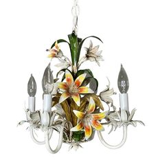 a chandelier with flowers hanging from it