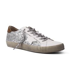 Paula Silver Sparkle Shu Shop Sneaker! Distressed sneaker with detail and distressed bottom. These fashion sneakers are made with a faux leather upper and contrast color and textured details. Lace-up fit Closed round toe Soft synthetic lining Cushioned footbed Rubber sole Fringe Sneakers, Stylish Shoes For Women, Studded Sneakers, Metallic Sneakers, Glitter Sneakers, Cute Sneakers, Star Shoes, Cute Boots, Silver Sparkle