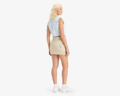 Your favorite cargos;in skirt form. With an ultra-flattering mid rise and an above-the-knee length cut, our Mini Cargo Skirt features oversized patch pockets and effortless '90s style. A throwback cargo skirt With an ultra-flattering mid rise Cut with a mini length Cargo Skirt, 90s Style, Green Skirt, Above The Knee, 90s Fashion, Patch Pocket, Dress Skirt, Levi's, Mini Skirt