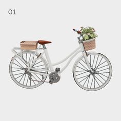 a white bicycle with a basket full of flowers