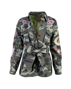 Our meticulously crafted jacket is a true embodiment of versatility and bohemian extravagance. Adorned with intricate embroidery on the sleeves, front pockets, chest, and back, it commands attention wherever you go. While the rugged camouflage fabric offers durability, the luxurious tropical printed silk lining offers a touch of lavishness. Elevate your style with the optional matching tie belt, while the dark-hued logo-engraved buttons add a timeless charm to this contemporary piece. Crafted fr Mystical Goddess, Diy Fashion Accessories, Blazer Jackets For Women, Expensive Taste, Diy Clothing, Camo Jacket, Intricate Embroidery, Printed Silk