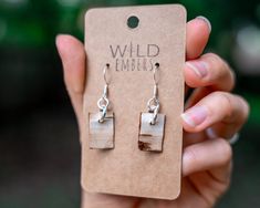 Handcrafted birch bark earrings locally foraged from the forest floor. Both front and back of the earring showcase its organic textures and natural wood grain. By nature, these earrings are lightweight and each pair unique. Finished with a silver hook to blend the warmth of nature with a classic touch. Birch Bark Jewelry, Bark Jewelry, Earthy Earrings, Organic Textures, Jewelry Wood, Earrings Nature, Forest Floor, Birch Bark, Made Jewelry