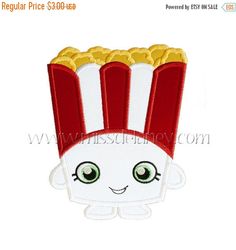 a machine embroidered applique with a cute popcorn box on it's face