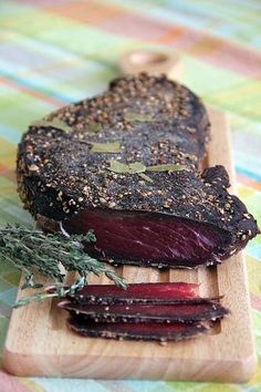 some kind of food that is on a cutting board