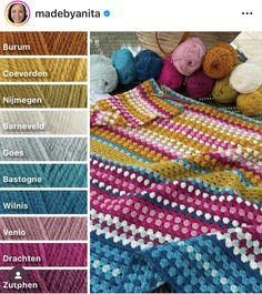 a crocheted blanket with different colors on it and the words madebynat written in