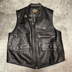 Brand: Harley Davidson Color: Black Size: Men's Large Condition: Gently Used - Good Please Note: Color May Vary Slightly Due To Screen And Lighting. All Items, Unless Marked Nwt, Are Gently Used And May Have Signs Of Wear. Vintage Items Are 20-40 Years Old!!! We Try To Call Out Any Flaws/Imperfections In The Description. Please View All Photos For Condition And Feel Free To Message Me For More Pictures Or Measurements. Please Wash All Items Prior To Wear. Vintage Clothing May Run Smaller Than Mo Casual Leather Vest, Black Casual Leather Vest, Casual Black Leather Vest, Harley Davidson Vest, Vintage Harley Davidson Motorcycles, Mens Rain Jacket, Black Leather Vest, Coats Vintage, Vintage Jean Jacket