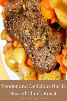 tender and delicious garlic seasoned chuck roast with potatoes, carrots, and parsley