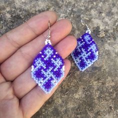 These blue dangle earrings are handmade for you. These colourful beaded earrings are ethnic inspired with a Celtic design. These cheerful drop earrings are a statement jewelry with a hippie style. ☀ Let  the  weave  connect  you  with  the  women  tribe ☀ ✦ EARRINGS ✦ Length: 4.5 cm, without the hook These earrings are inspired by the colourful Huichol beadwork but with a Celtic design of my own. ✦ MATERIALS ✦ I weave your earrings with crystal beads. The hooks are sterling silver or stainless s Artisan Purple Beaded Dangle Earrings, Handmade Traditional Purple Beaded Earrings, Traditional Handmade Purple Beaded Earrings, Artisan Beaded Purple Earrings, Purple Artisan Earrings With Dangling Beads, Artisan Purple Earrings With Dangling Beads, Handmade Purple Artisan Beaded Earrings, Handmade Artisan Purple Beaded Earrings, Traditional Purple Earrings With Colorful Beads