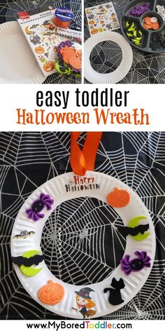 a paper plate wreath with halloween decorations on it