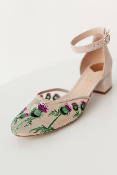 Wedding sandals 'ALINA' are handcrafted from soft Italian ivory suede with handmade thistle embroidery on soft mesh. These shoes are embellished with the national Scottish flower, thistle, symbolizing the love of the couple to the land. This pair of bridal heels has a closed almond toe and a 4.5 cm / 1.8-inch low block heel. Inside there is a soft memory foam insole, which gives a feeling of additional comfort when walking. Tunit outsole is made of a mixture of leather chips and rubber, it's more wear-resistant than leather and more durable. Also, we use soft natural upper materials that wear well and take the shape of the foot. You can customize shoes' embroidery, heels, colors, etc. - we offer many options.  OUR SHOES ARE MADE-TO-MEASURE ONLY. We start to craft the shoes only after you p Embroidered Wedding Shoes For Summer Parties, Embroidered Low Heel Wedding Shoes, Wedding Heels With Floral Embroidery And Ankle Strap, Summer Wedding Heels With Floral Embroidery, Summer Wedding Embroidered Heels, Spring Wedding Embroidered Heels, Spring Wedding Shoes With Embroidery And Closed Toe, Spring Wedding Shoes With Embroidered Closed Toe, Spring Embroidered Formal Wedding Shoes