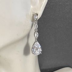 "CZ Pear Shape Drop Earrings , Sparkling CZ Teardrop Drop Earrings ,Marquise Stones ,Silver, Elegant CZ Earrings ,Weddings , Statement Earrings , DAZZLING AND SPARKLY !! Beautiful Earrings have a Pear shaped stone that hangs from marquise stones ! Looks like diamonds  1 1/4 \" Long  , SILVER PLATED  Please ask any questions as I do not accept returns! Thank You  I do offer discounts when buying multiple items" Earrings Weddings, Statement Earrings Wedding, Tear Drop Earrings, Bunny Costume, Pandora Style, Sparkle Earrings, Cz Earrings, Butterfly Pendant, Pear Shape