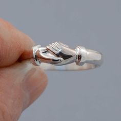 Mens Fede Ring, Handshake Ring, Symbol of Agreement, Friendship Ring  in 925 sterling silverA heavier version of our popular ring for the larger hand, made to your size   The Ring Measures 6.5mm across the hands and is 4mm across the band on the shoulders and at the back. This Ring is made to order in the size that is requested.We can use all international ring size scales so please just leave a note at checkout with your size.This ring is made to order, please allow 1-2 days production time. Yo Symbolic Sterling Silver Stackable Promise Rings, Sterling Silver Rings With Polished Finish For Promise, Sterling Silver Promise Jewelry, Symbolic Sterling Silver Stackable Rings For Anniversary, Adjustable Sterling Silver Anniversary Ring, Sterling Silver Rings With Polished Finish For Gift, Sterling Silver Stackable Promise Rings With Open Design, Symbolic Sterling Silver Rings For Anniversary, Promise Sterling Silver Stackable Open Rings