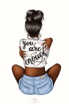 a woman sitting on the ground with her back to the camera, wearing a t - shirt that says you are enough